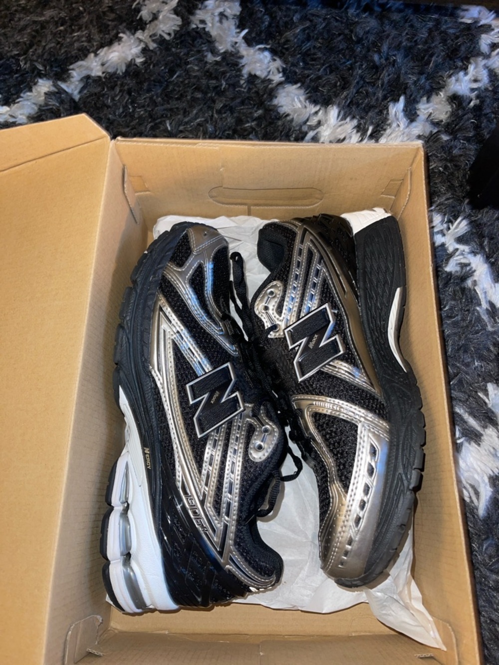 New Balance Black and Silver Running Sneakers